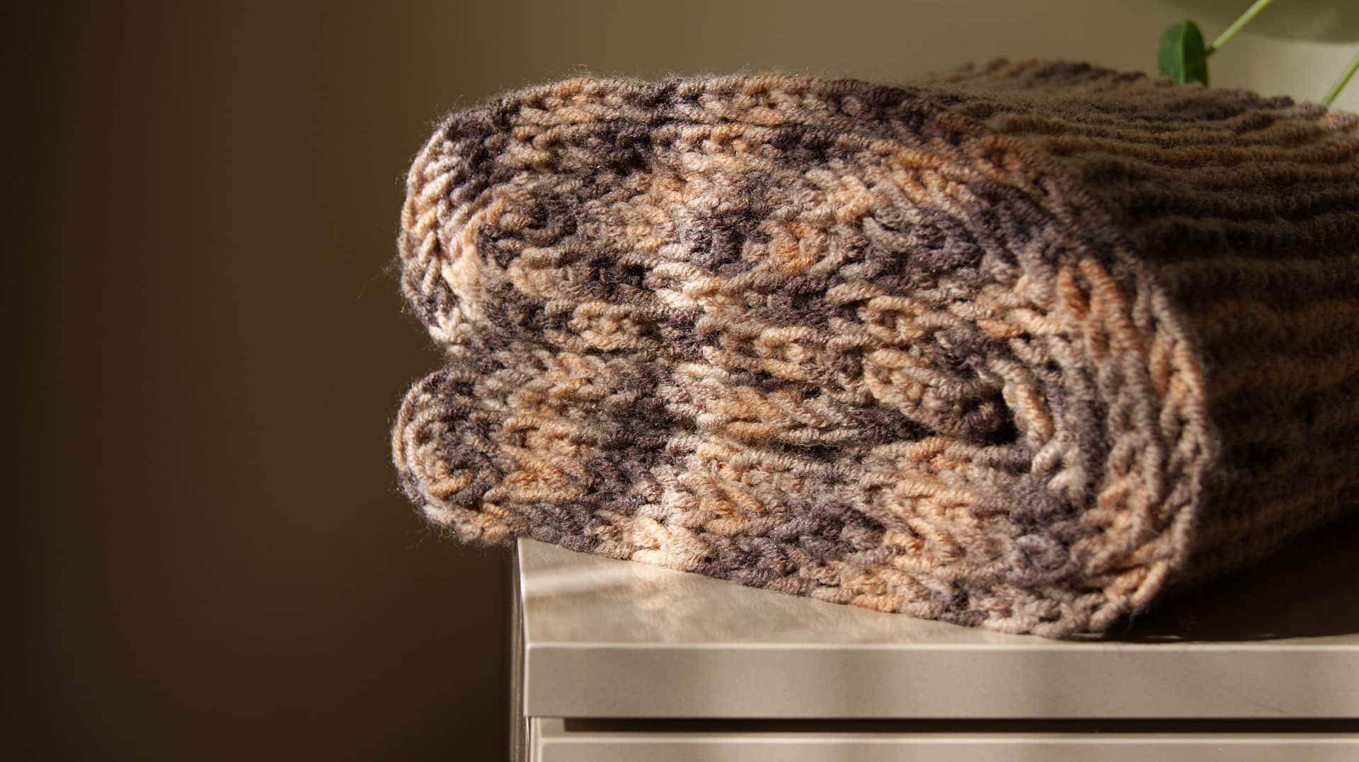 A folded woven blanket