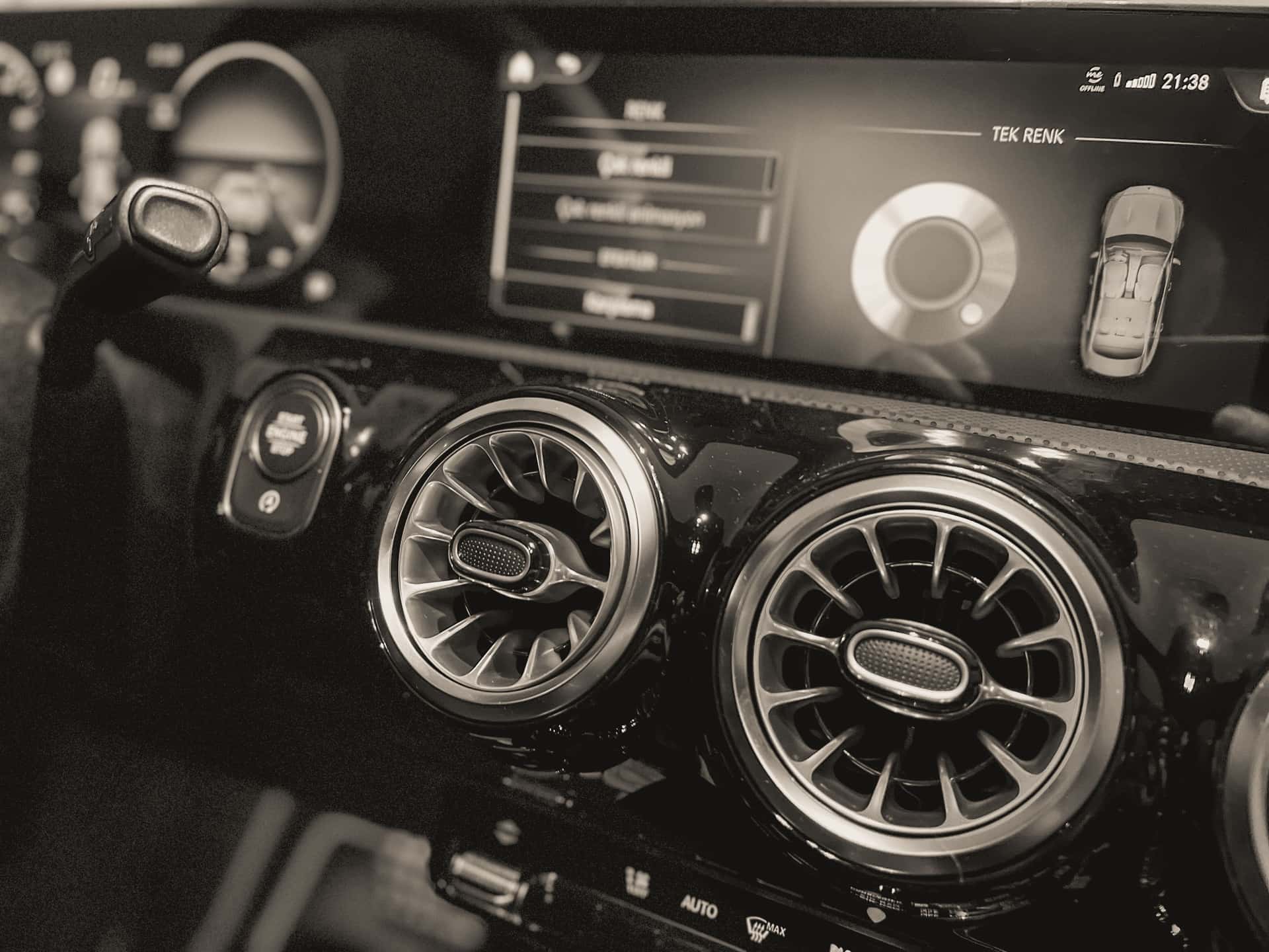 Air vents and controls on a car dashboard