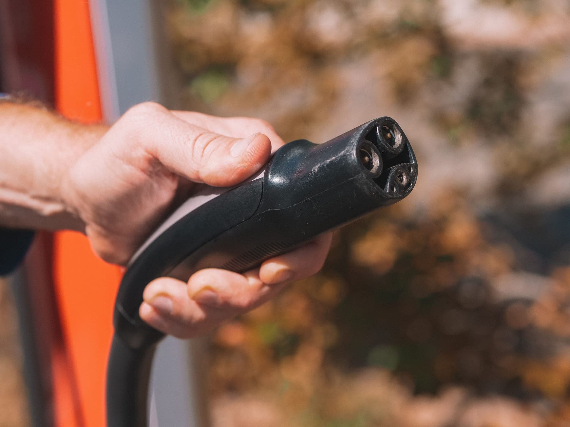 An electric vehicle charging port with the cable connected