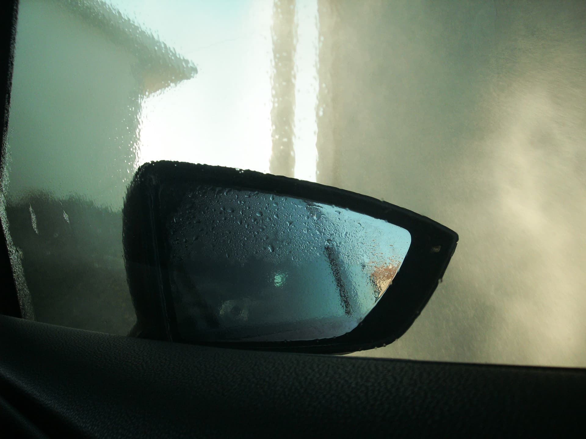 Condensation and water on a car window