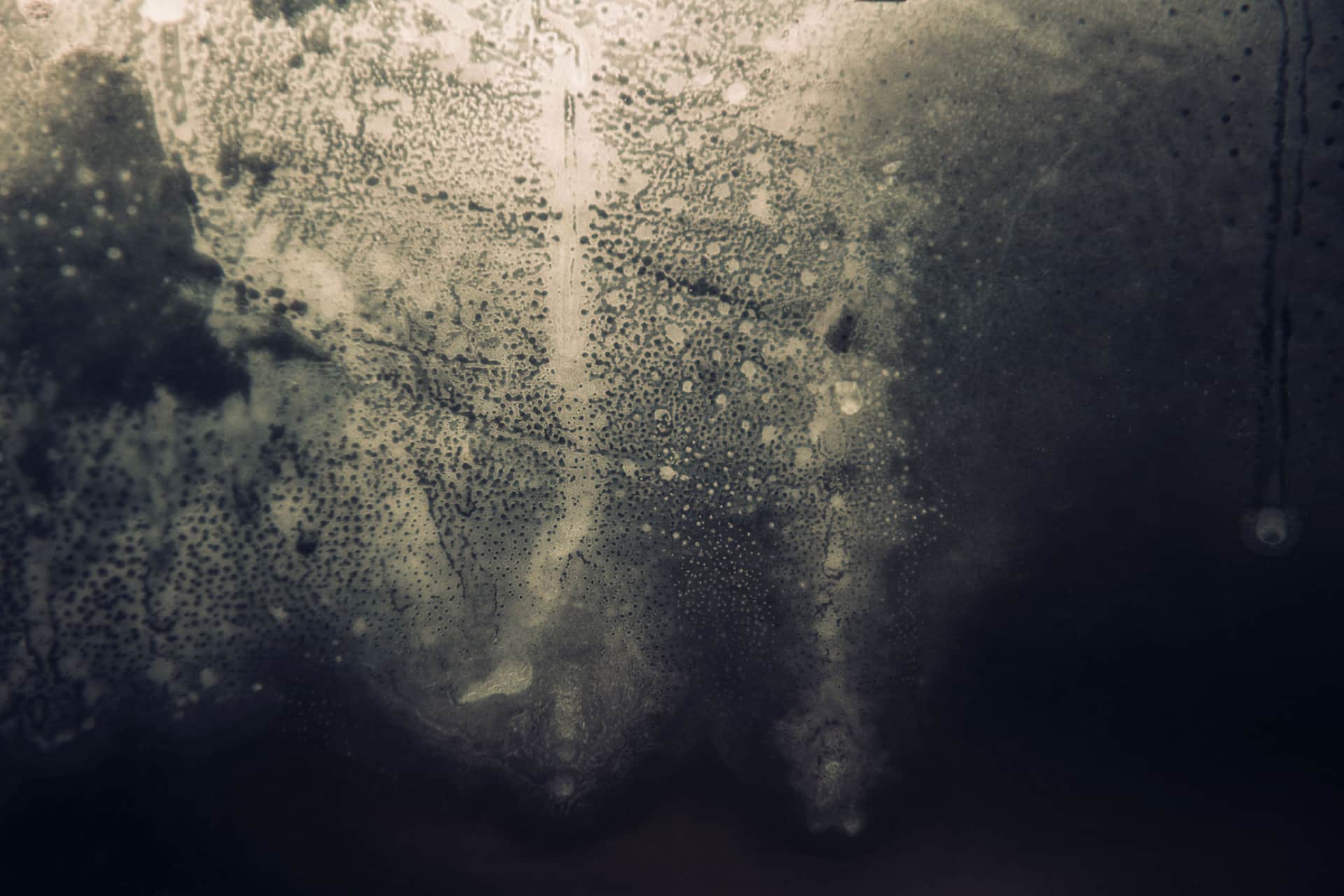 Condensation on the inside of a glass surface
