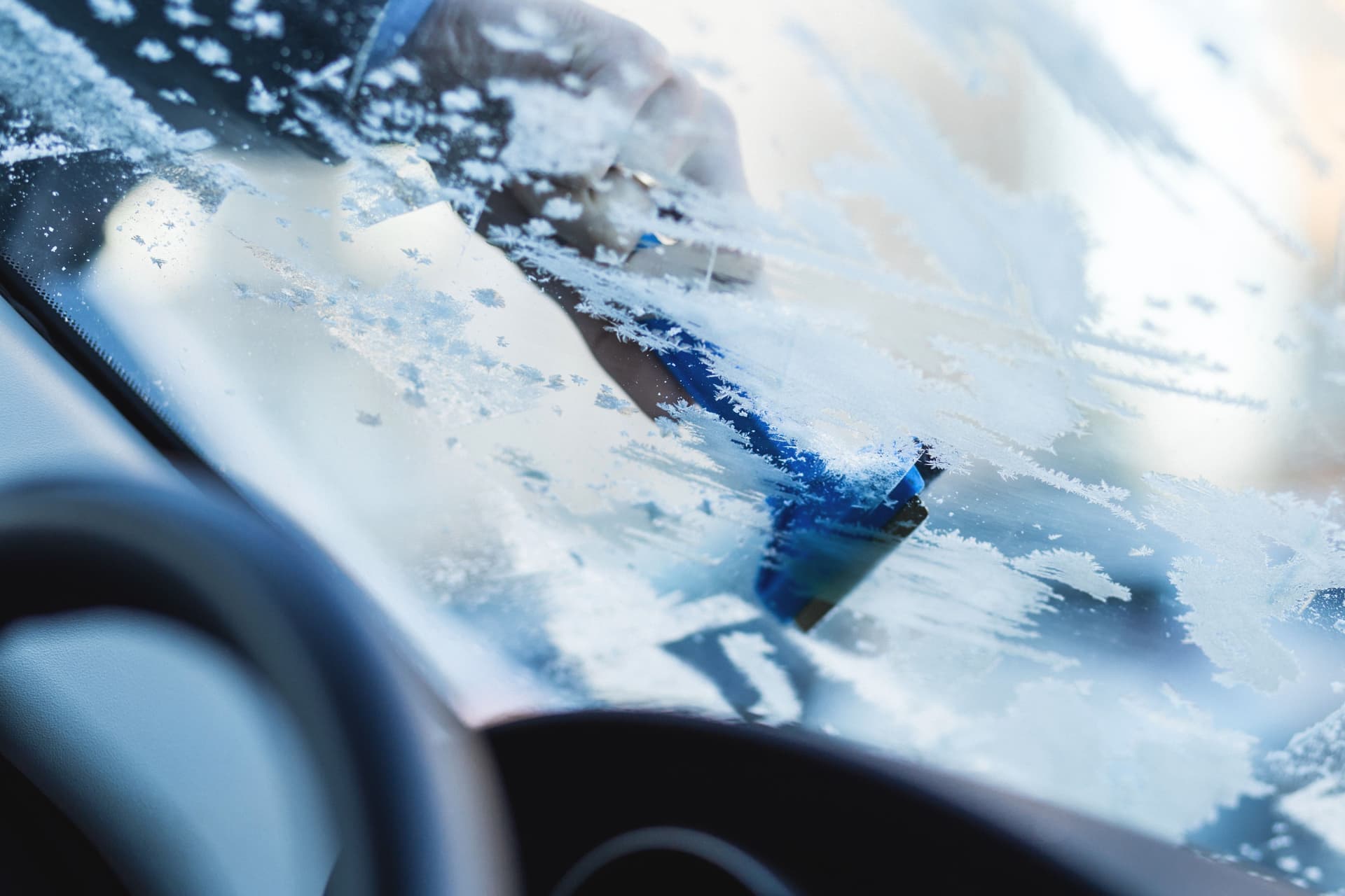 Ice on a car window in winter