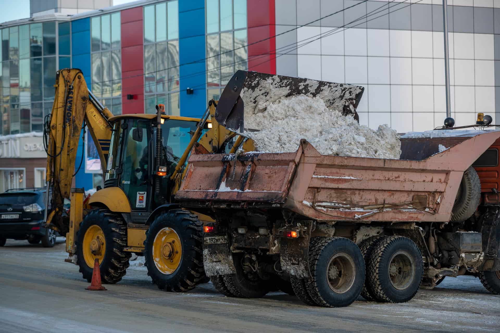 Clearing snow with a shovel in winter conditions