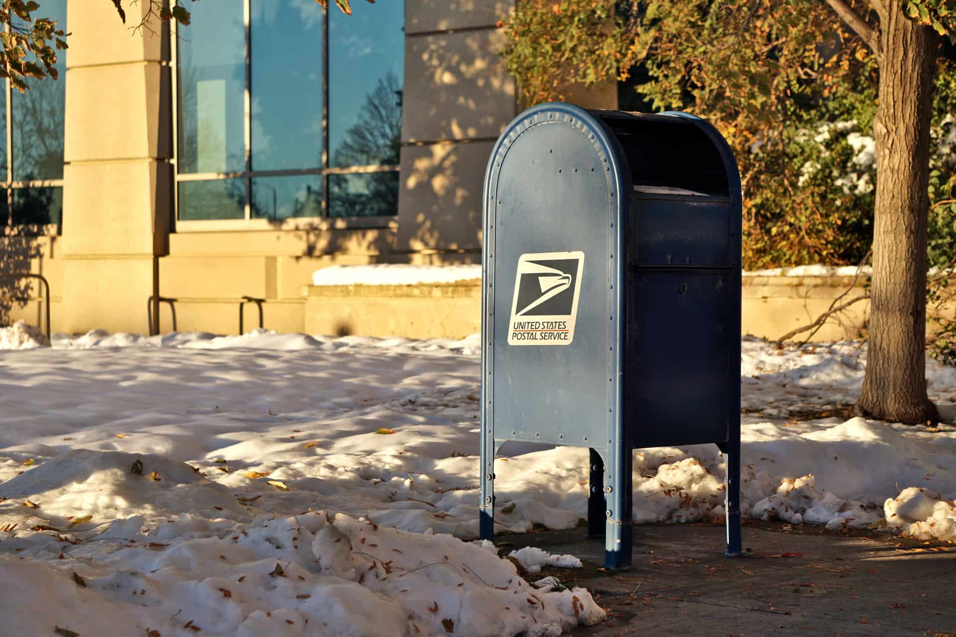 A mailbox standing in a snowy winter landscape