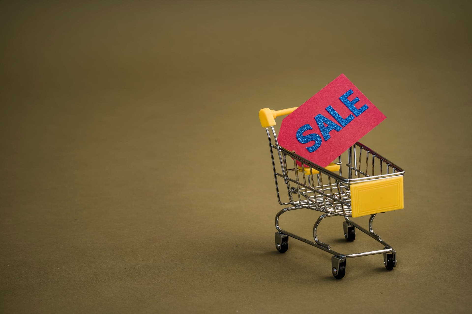 A shopping cart handle photographed close up